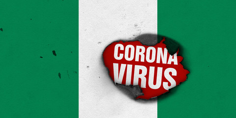 Flag of Nigeria with burned out hole showing Coronavirus name in it. 2019 - 2020 Novel Coronavirus (2019-nCoV) concept, for an outbreak occurs in Nigeria.