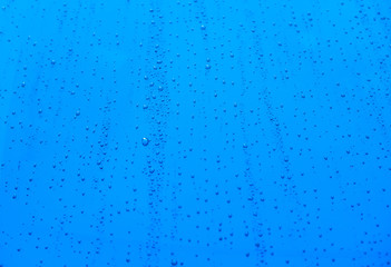 Close up of water drops on background. Abstarct  texture with bubbles on window glass surface. Raindrop, Realistic pure water droplets condensed for creative banner design
