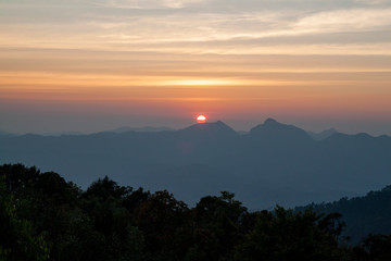 The sunset on mountain in national park at thailand