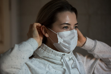 portrait of a girl in a protective mask against coronavirus. Covid 2019.
