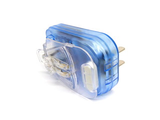 Transparent blue mobile phone charger isolated on white background. Battery charger. Wall charger. USB charger.