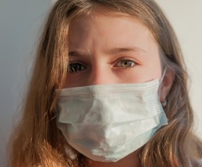 A girl in medical mask