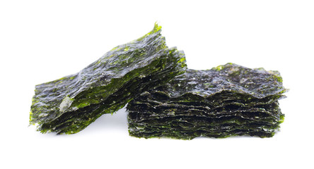 Crispy nori seaweed isolated on white background. Japanese food nori. Dry seaweed sheets.