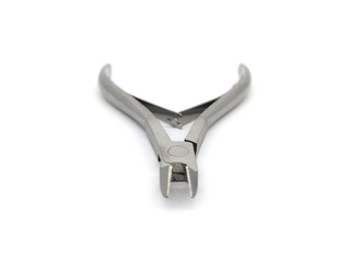 Stainless steel nail scissors isolated on white background. Cuticle cutter. Cuticle scissors. Manicure scissors. Nail clipper. Nail cutter.