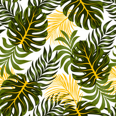 Abstract seamless tropical pattern with bright leaves and plants on a white background. Beautiful print with hand drawn exotic plants.  Seamless pattern with colorful leaves and plants.