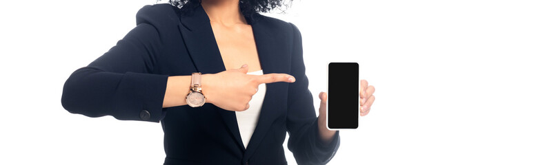 Cropped view of african american woman pointing at smartphone isolated on white, panoramic shot