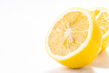 Fresh juicy lemon on white background with copy space for your design. Healthy food concept.