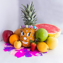 Different fresh fruits, pineapple, apples, oranges, guava, strawberry , watermelon