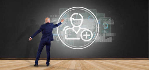 Businessman holding new contact icon