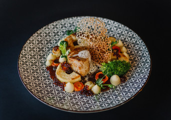 Traditional Bulgarian hotch-potch in a new read pork tenderloin, stewed and roasted vegetables,...