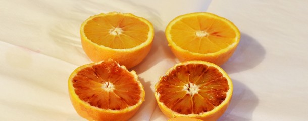 fresh oranges on wooden table