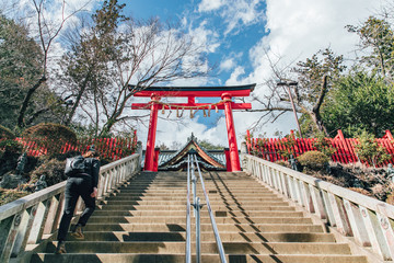 Japanese shrine gate with long stairs