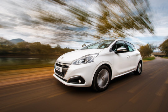 White Peugeot 208 car