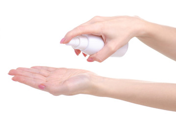White bottle antiseptic antibacterial disinfection in hand on white background isolation
