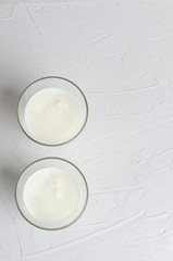 Home-made fermented kefir drink on a white background, copy space.
