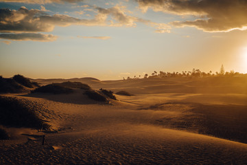 Maspalomas, Canary Islands. Desert dunes at sunset with very orange tones