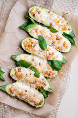 Zucchini baked with cheese and pine nuts