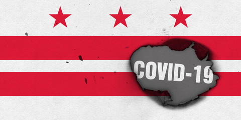 Flag of Washington DC with burned out hole showing Coronavirus name in it. 2019 - 2020 Novel Coronavirus (2019-nCoV) concept, for an outbreak occurs in Washington DC, USA.