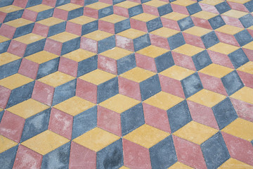 paving slabs in the form of cubes perspective from objects going into the distance