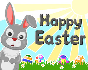 Hare looks out on a background of green grass with Easter eggs. Easter