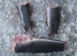 Fresh fish fillet on ice. Healthy food, styling, cooking concept.