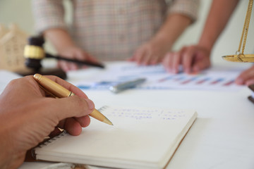 Naklejka premium Lawyers are describing the sale transaction of a home sales project.Concepts of law