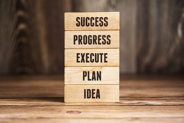 Wooden Block Ladder of Success. Business and Career Progress Concept.