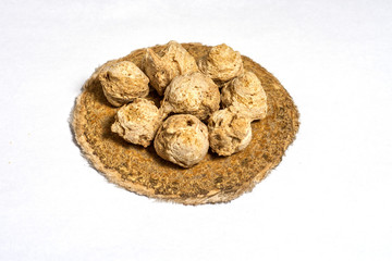 Several pieces of soy meat isolated on a white background.