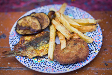 Moroccan fried sardines with aubergine, fries and potato pancake 
