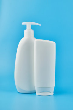 Two Generic Product Tubes On Blue Background