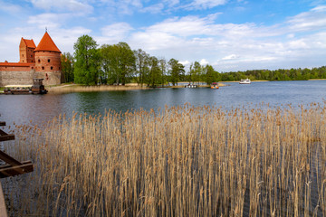 Fototapeta na wymiar On the lake Galve near Castle. Trakai, Lithuania – 2019, May