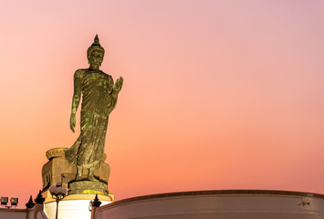 The Buddha statue is located at Phutthamonthon sai 4 Park, Nakhon Pathom Province, Thailand.