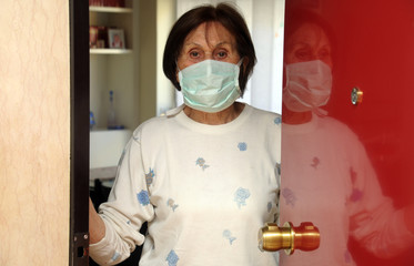 Europe, Italy, Milan - Pandemic emergency n-cov19 Coronavirus - Domestic life in quarantine of 70...