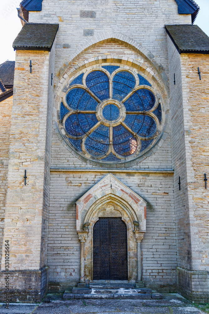 Wall mural Entrance to Varnhem Church with a rose window