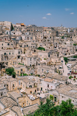 Fototapeta na wymiar View of the narrow streets of an ancient European city.