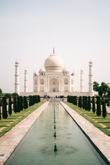 Fototapeta na wymiar Taj Mahal, Agra in mid day with garden and fountain in front