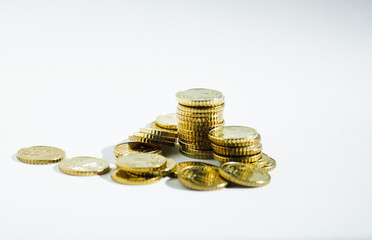 pile of coins isolated on white background