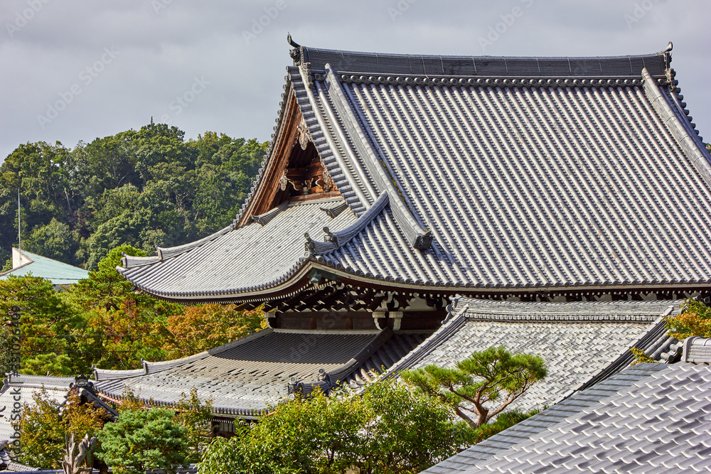 Wall mural roof of old building in kyoto