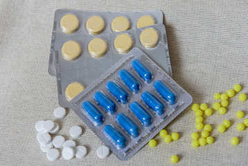 Different tablets in packaging and without. The treatment of the disease. Medicines for the virus. COVID - 19