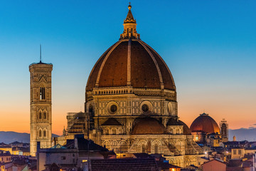 Rooftop skyline panorama of Cathedral of Santa Maria del Fiore (Duomo) in Florence at sunset during blue hour