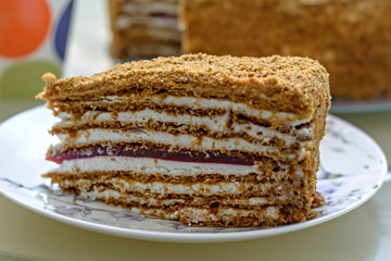Slice of layered russian honey cake