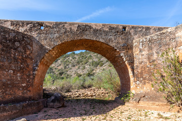 old roman Bridge in Paderme, Algarve, Portugal