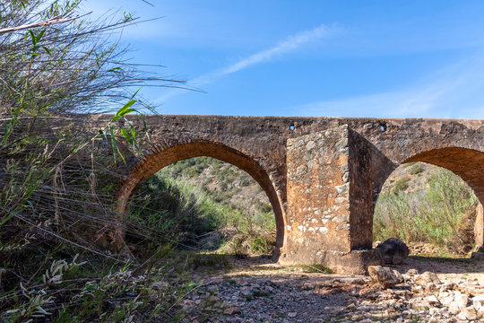 old roman Bridge in Paderme, Algarve, Portugal