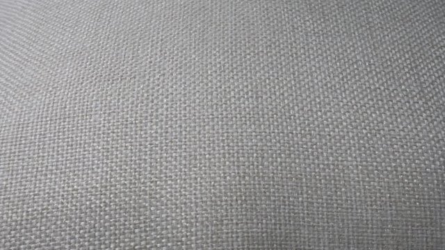 Grey cloth textile surface. Wool fabric texture. Copy space for text. Fabric samples