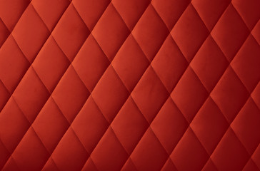 Fototapeta na wymiar Red leather upholstery background texture