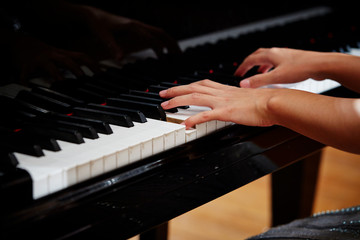 Fototapeta na wymiar A woman playing the piano