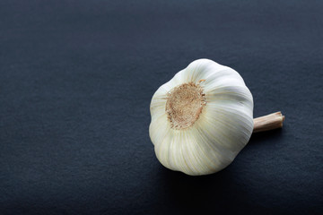garlic on a black background