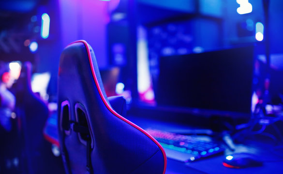 Professional place streamer video gamers room with computer. Cyber sport championship neon color lights
