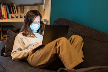 A white girl is working from home during Coronavirus or Covid-19 quarantine, coronavirus covid 19...