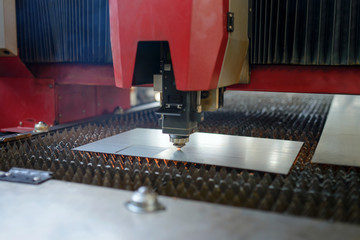 Industrial fiber laser cutter. Plasma cutting of metal.